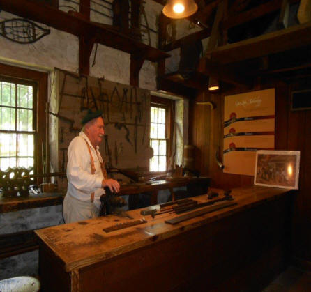 Gun smith at gunshop  at Landis Valley Village and Farm Museum located near Lancaste