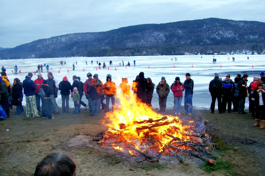 bonfire on the shores of Lake George in winter