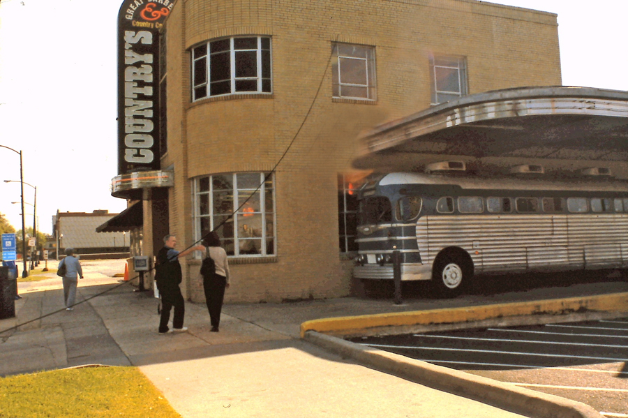 Country's exterior with diner bus on side of building in Columbus, GA