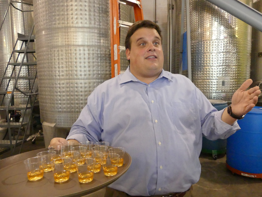 Guide offering samples at Wigle Whiskey in Pittsburgh