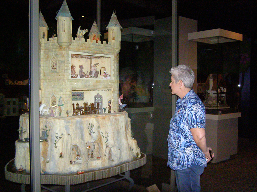 Visitor Jane Kaskelin front of the Irish Fairy Castle./font>