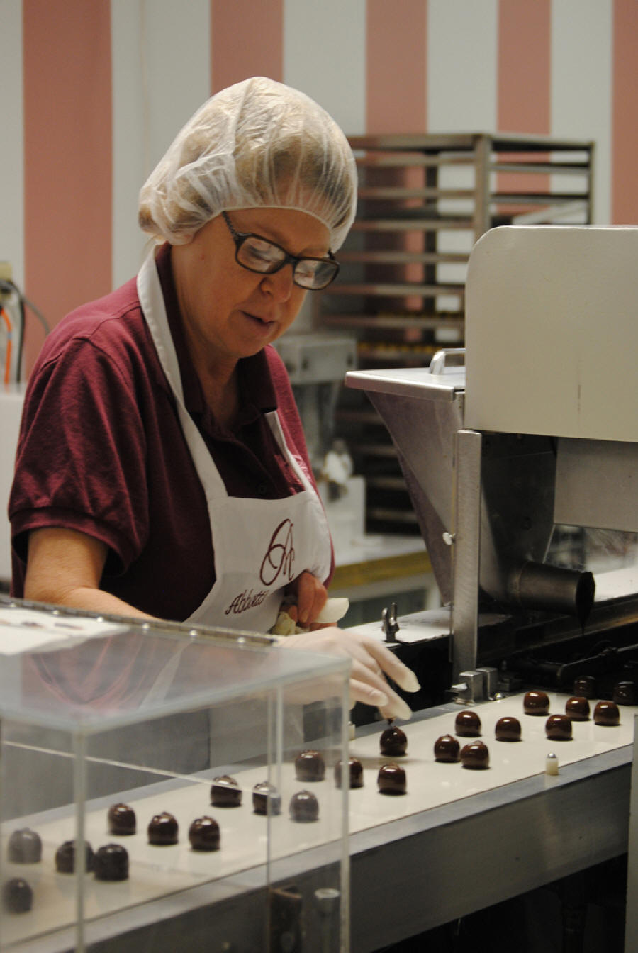 Chocolatier making candies at Abbots Candy Shop on Indiana's Chocolate Trail
