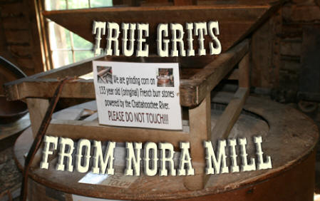 hopper for the mill at Nora Mill with title "True Grits From Nors Mill" on it