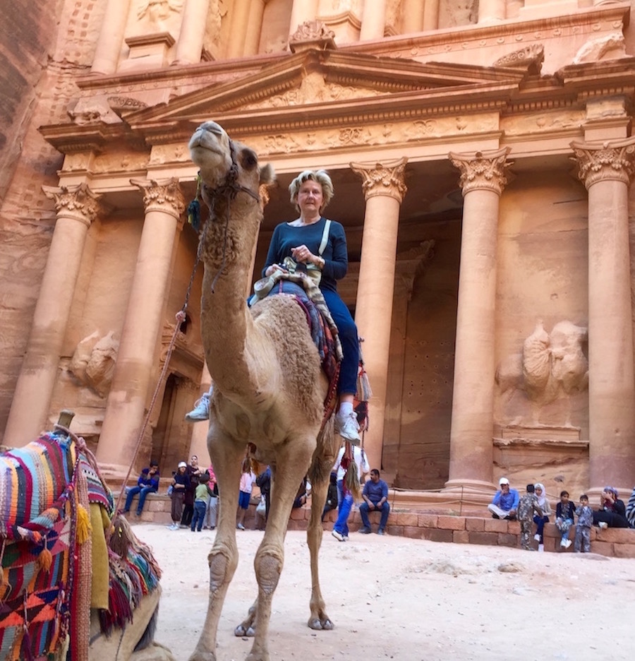 Author on camel in front of Treasury in Petra, Jordan