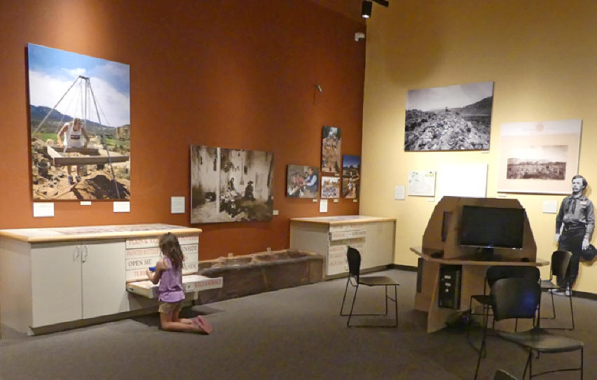 Little girl looking at exhibits at Anasazi Heritage Center
