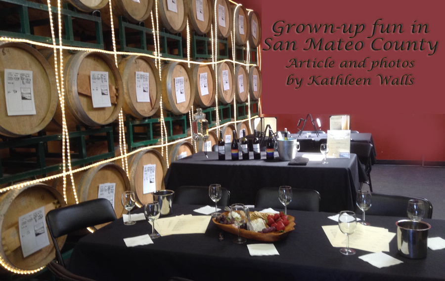 image of tables set with food and wine agains a backgroudn of wine barrels used as header for Grown up Fun in San Mateo County