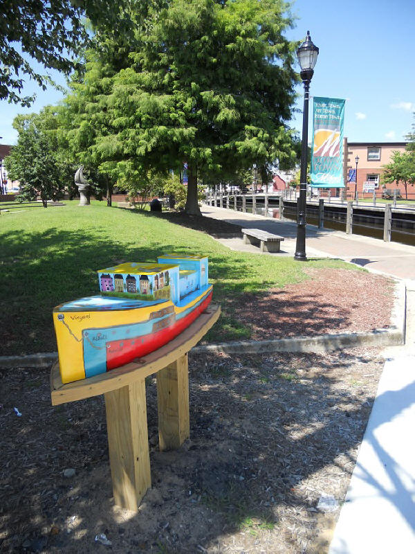 Downtown Milford's Art on the Riverwalk Tour ship deptiting shipbuilding history and bird life