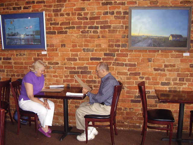 O'Hara's brick walls make a good rustic backdrop for the art.JPG (129368 bytes)