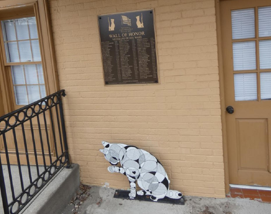 painted metal at by wall of honor