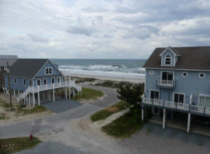 beach between two homes
