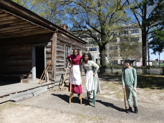 young reenactors at farmstead
