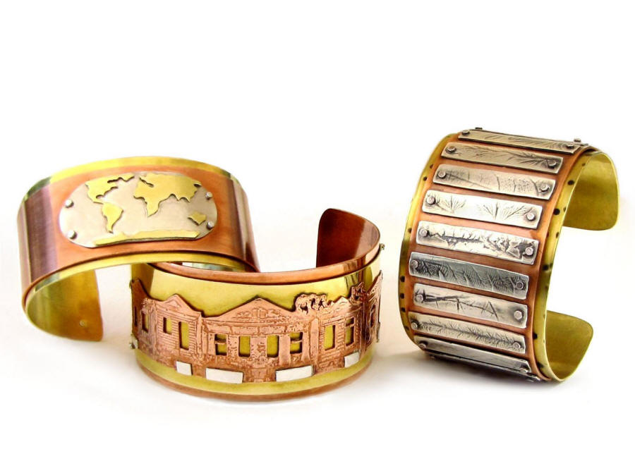 Riveted cuffs by NOLA artist Maria Fomich at RHINO