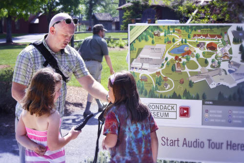 Children study map at Adirondack Museum, Blue Mountain Lake New York