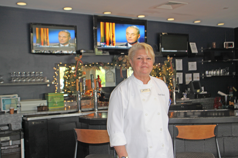 Chef Rusty Evers in front of bar at Waterworks Bar and Grill at Barrymore Hoitel in Tampa
