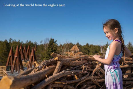 Litttle girl at Eagles nest at Wild Center in Adirondacks
