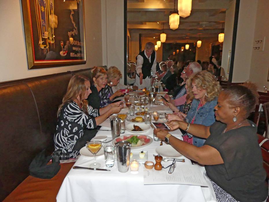 Group at table in Highlands Bar and Grill in Birmingham, AL