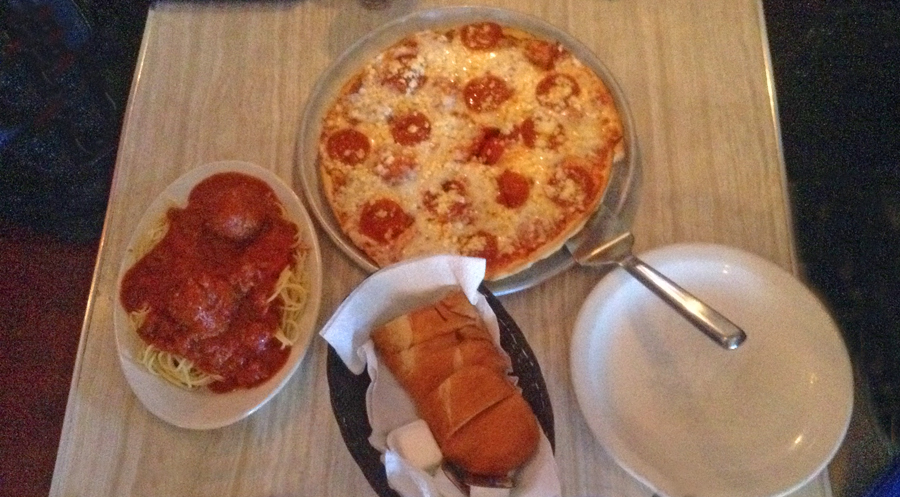 Pizza and spagetti and meatballs with bread at Luigi’s in Augusta, Georgia