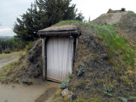 entrance to earth lodge at dancing leaf cultural learning center in the sandhills of Nebraska