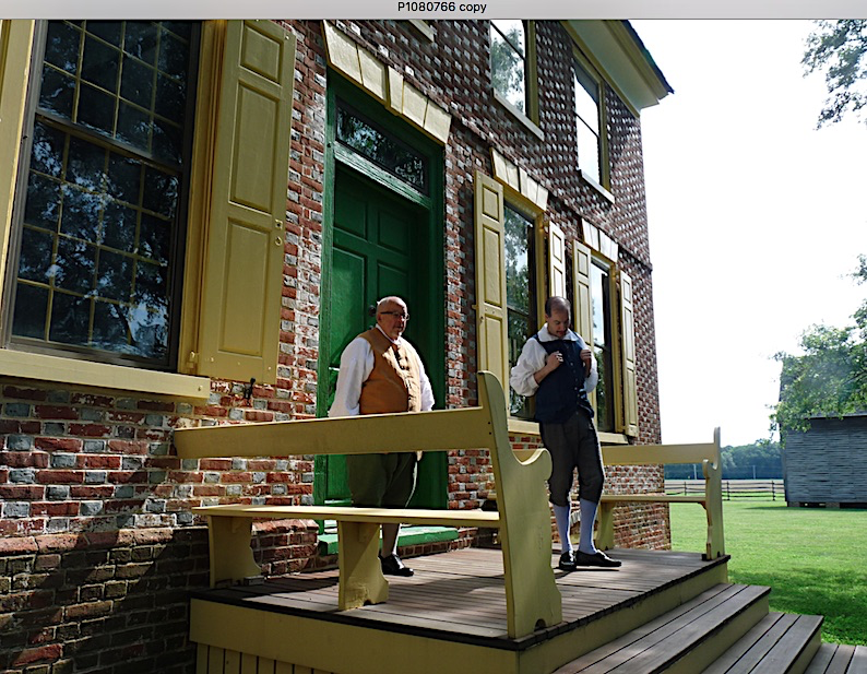 Two male reenactors in front of Dickinson Mansion in Delaware