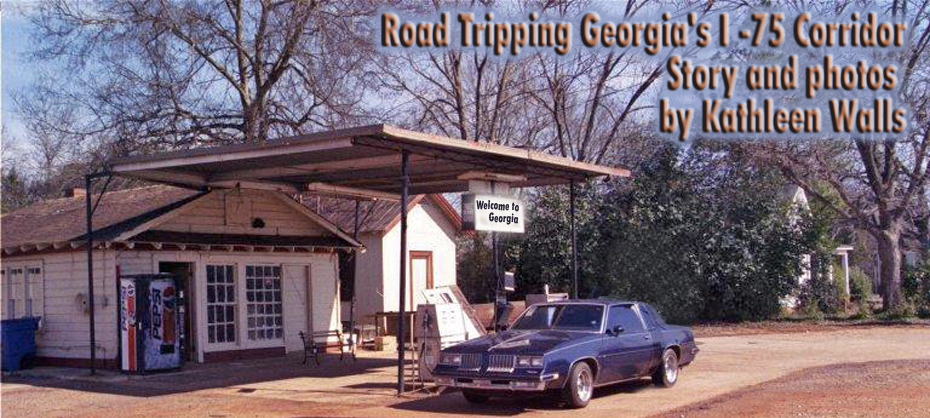 car in gas station on rural road