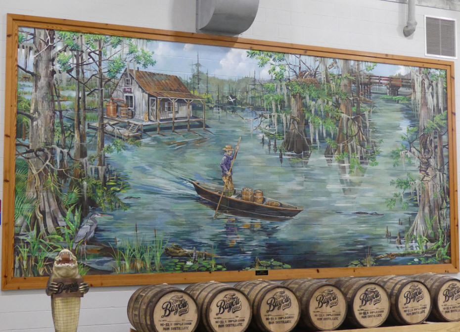 mural of still on bayou cabinand man in pirogure