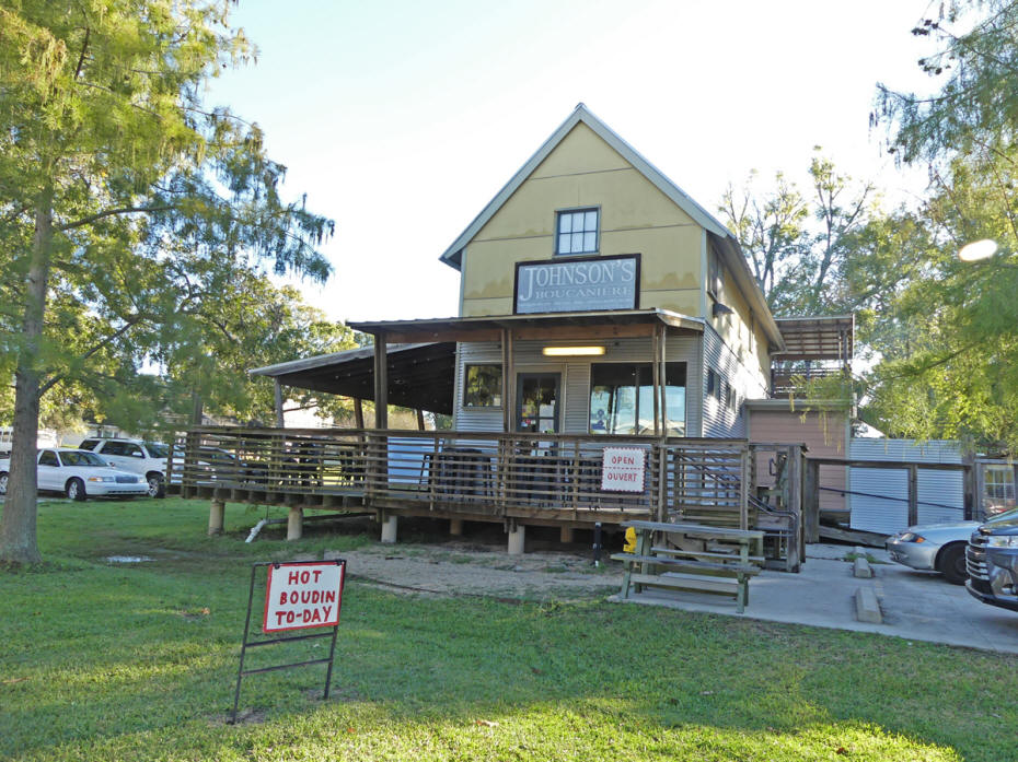 small two story grocery smoikehouse