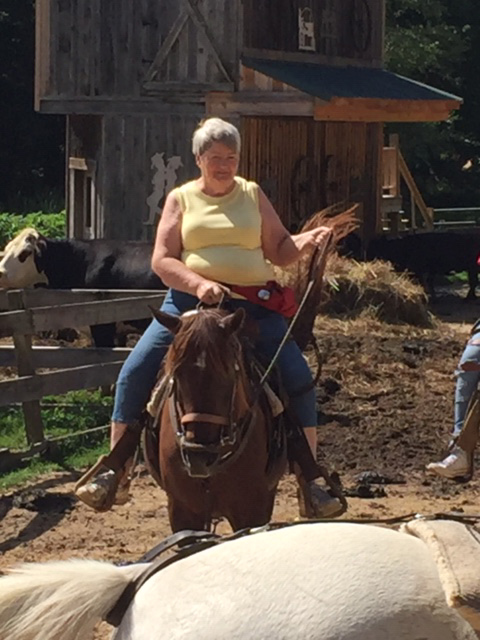 Woman riding horse 