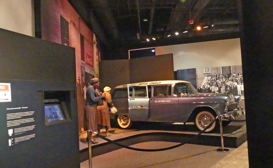 exhibit ofbus boycotters boarding taxi at Rosa Parks Museum