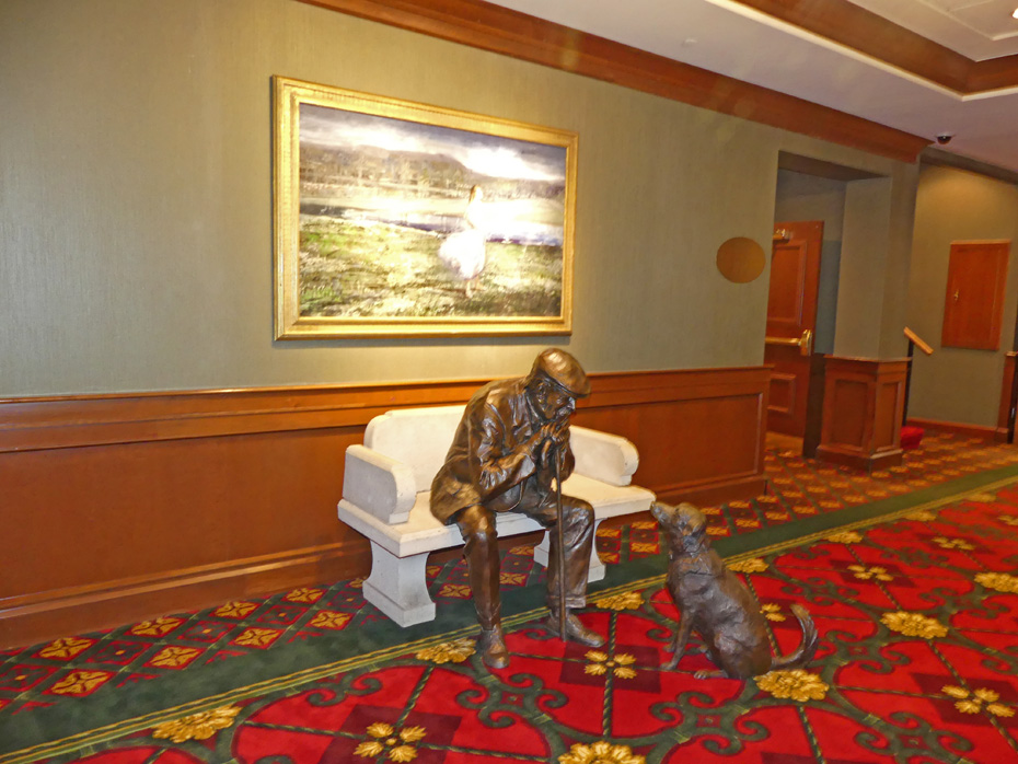 sculpter of man and his dog inNemacolin Woodlands Resort lobby