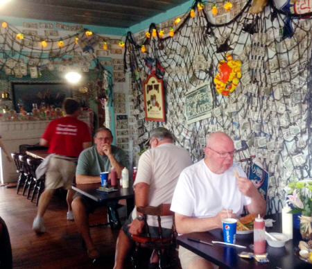wall covered wiht dollar bills at Peace River Seafood in Punta Gorda, Florida 
