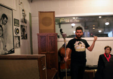 Guide explaingn exhibits  at Sun Studio in Mamphis Tennessee. 