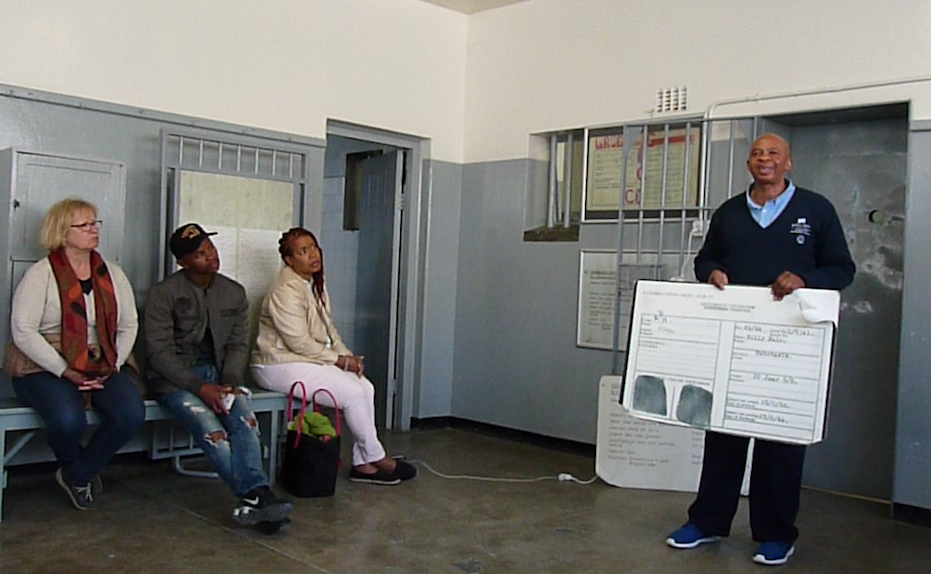 Tour guide explains Robbens Island Prison