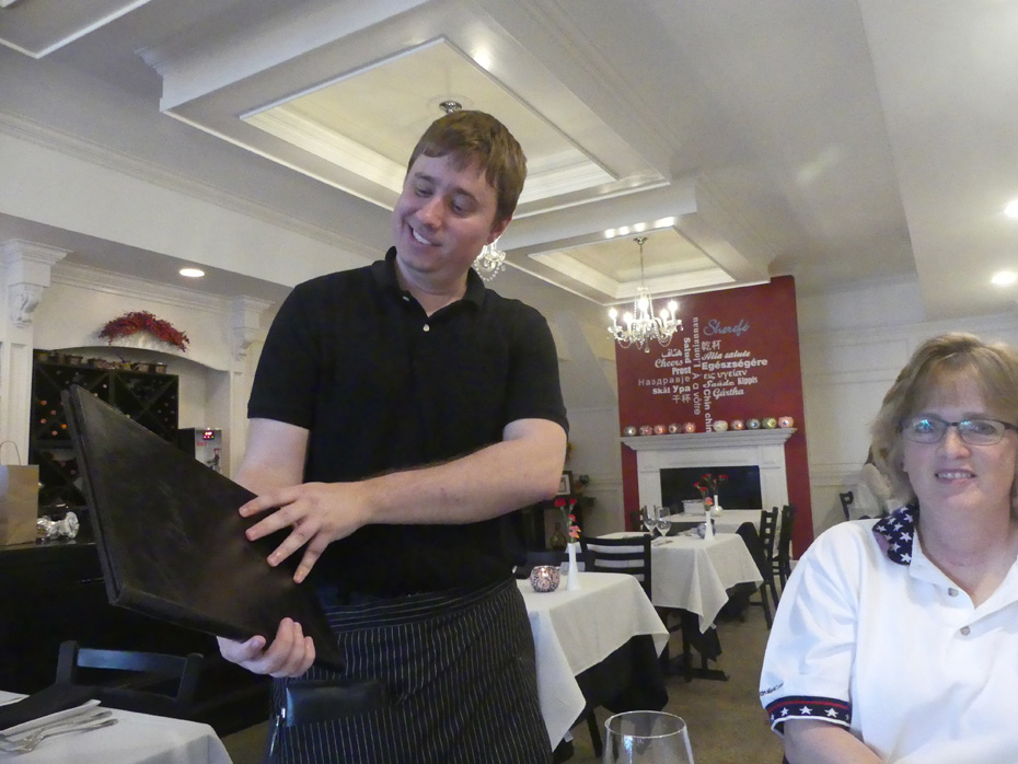 Waiter, Paul, prepares to take our order