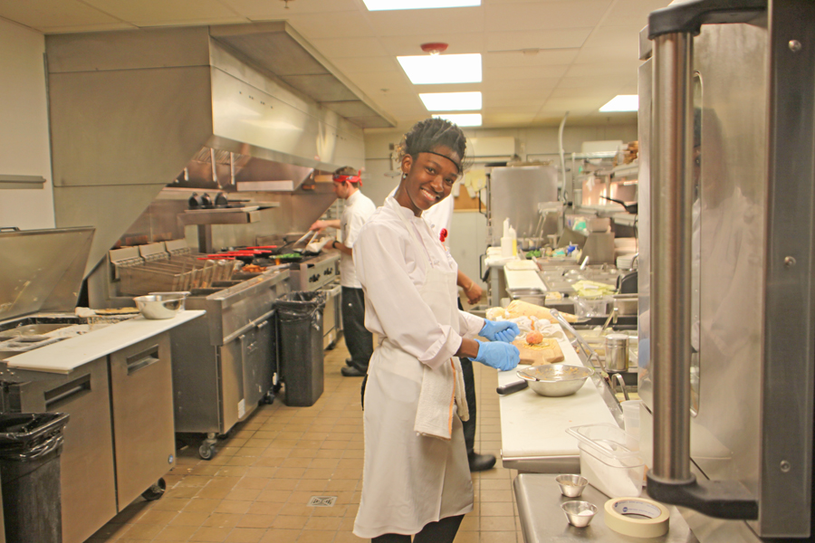 Kitchen with two Sou Chefs preparing food  at the Edison