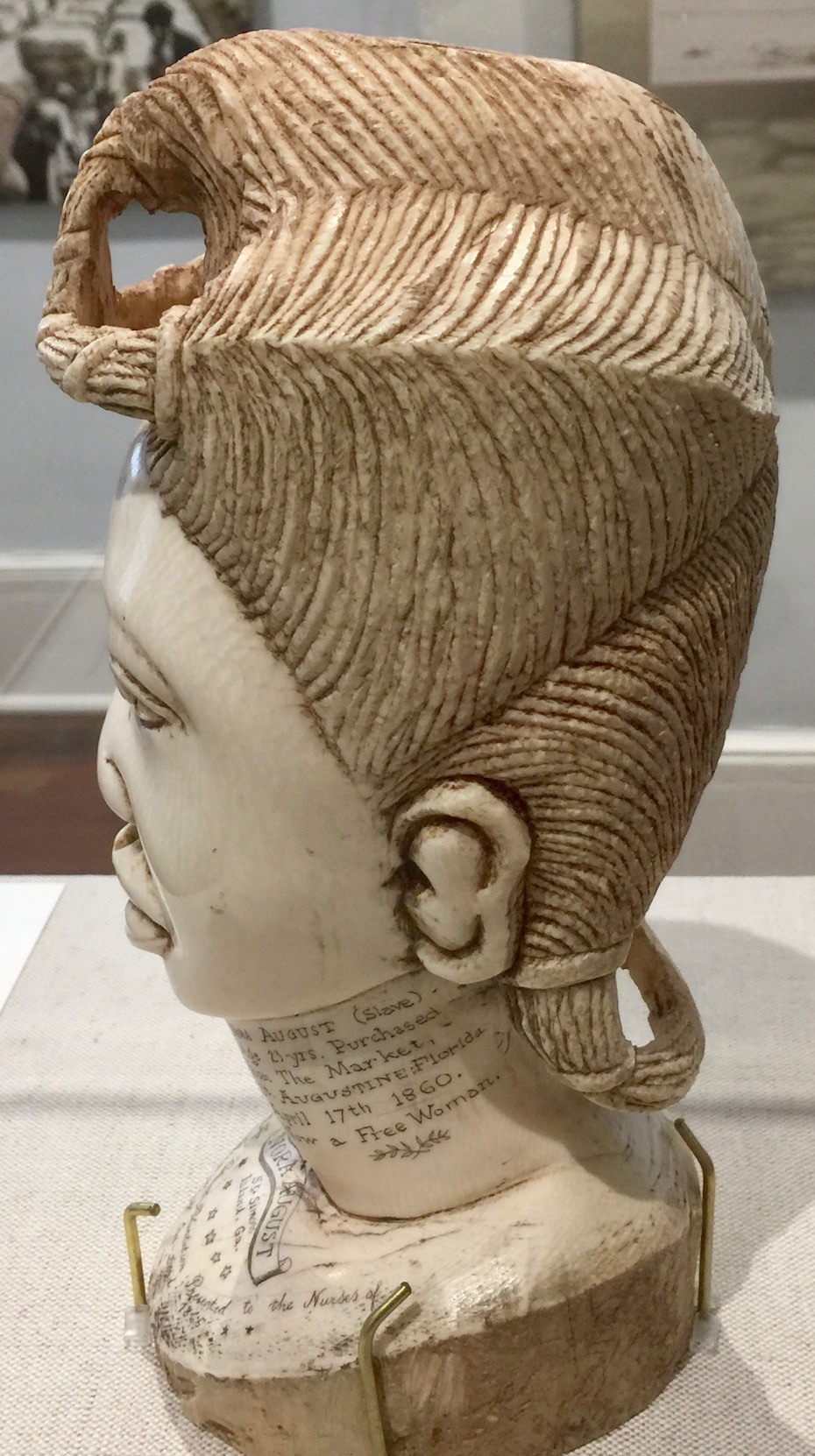 sideview The bust of Nora August, carved in ivory,