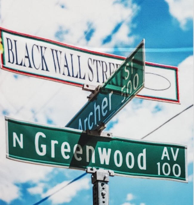 black wall st sign