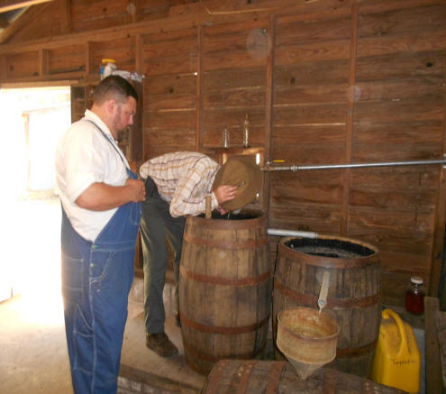 two men one smelling turpintine barral