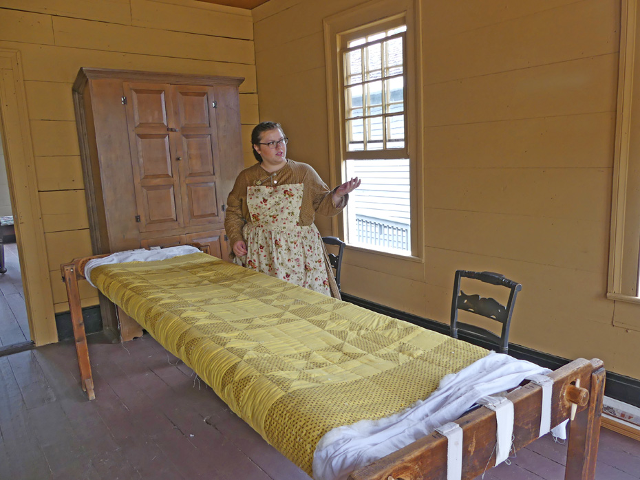docent explains quilting at westville
